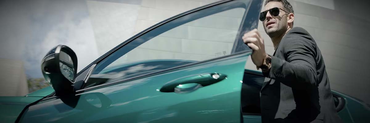 Person opening door of a vehicle.
