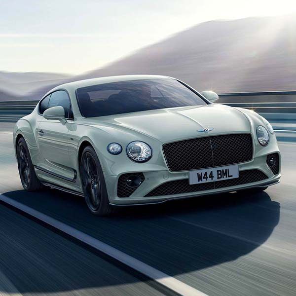 2024 Bentley CONTINENTAL GT SPEED EDITION 12 driving on a street.