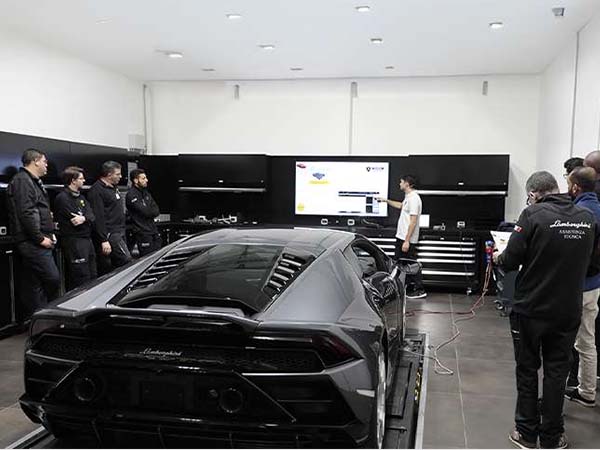 Lamborghini Service Techs in the service bay